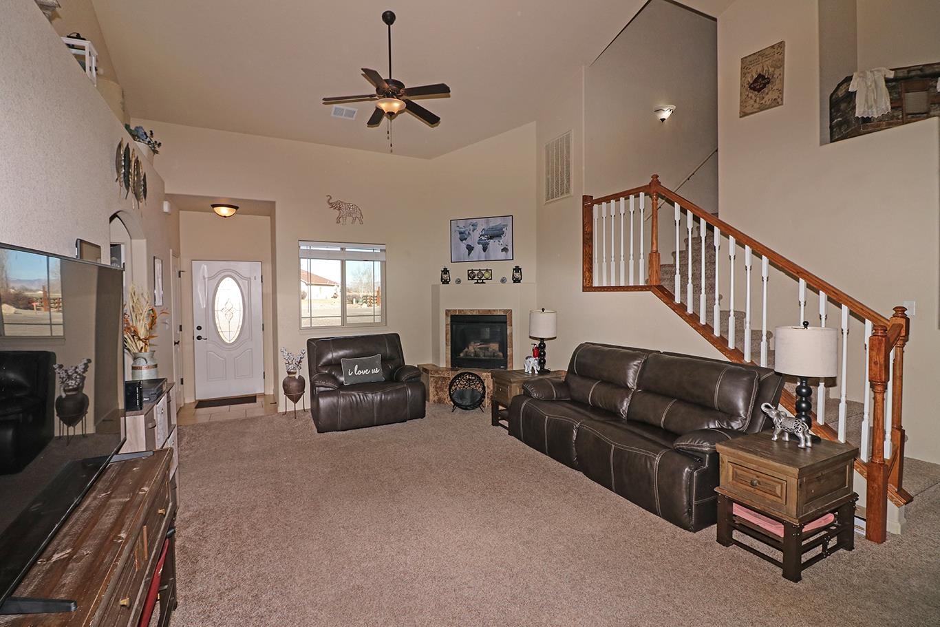 2011 Roma Avenue Fruita, CO 81521 - Photo 4 of 31 a living room with furniture and a fireplace