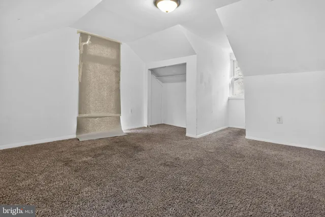 an empty room with an entryway