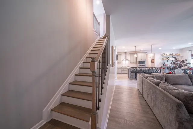 a view of a living room and entryway