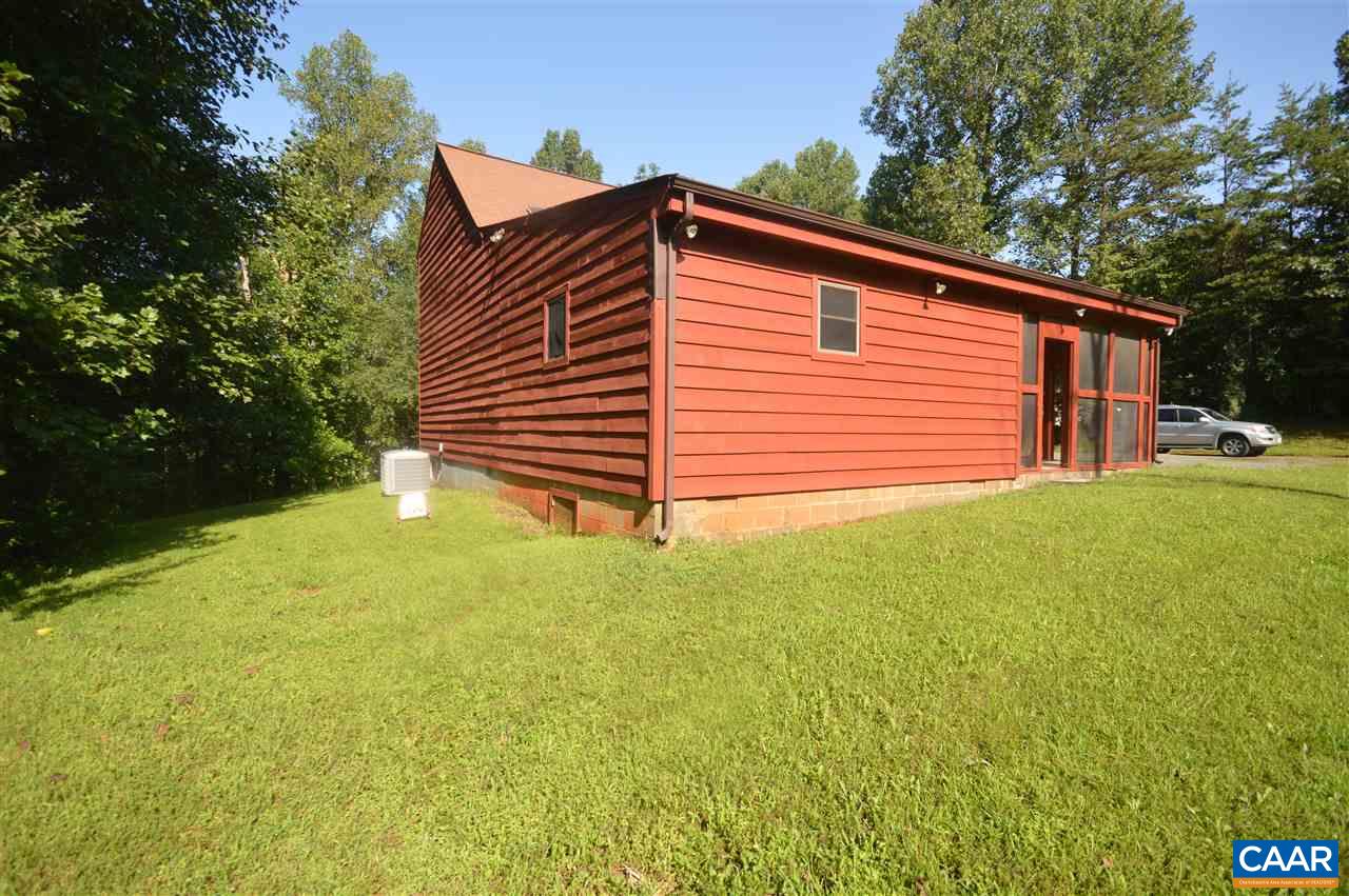 95 Westview Road Ruckersville, VA 22968 - Photo 16 of 42 a backyard of a house with lots of green space
