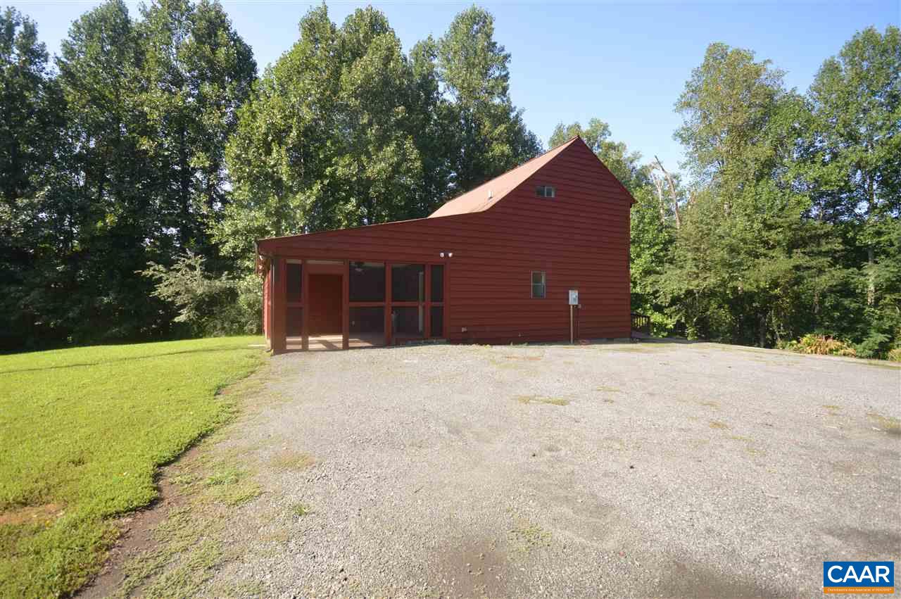 95 Westview Road Ruckersville, VA 22968 - Photo 17 of 42 a front view of a house with a yard and garage