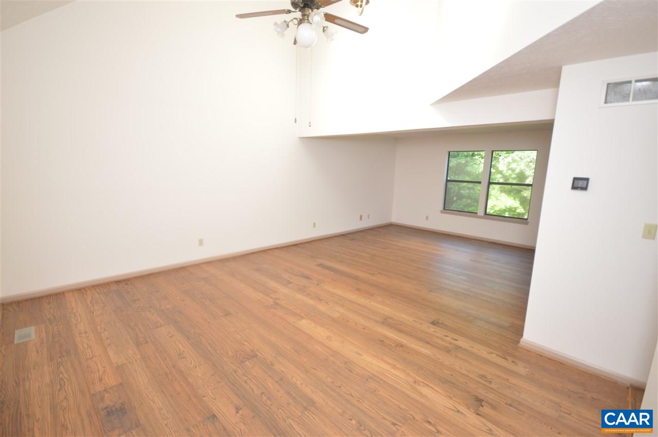 95 Westview Road Ruckersville, VA 22968 - Photo 22 of 42 an empty room with wooden floor and windows