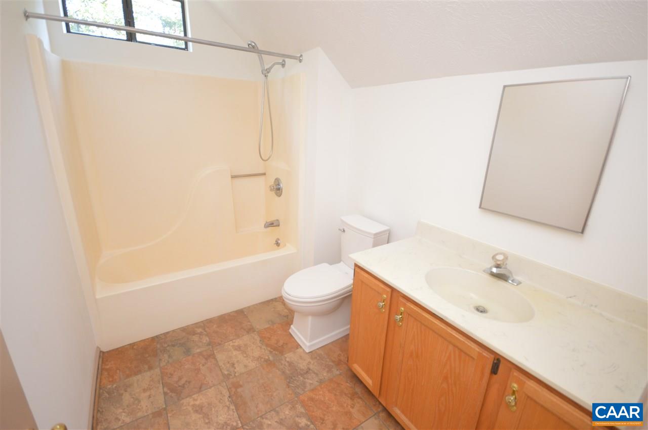 95 Westview Road Ruckersville, VA 22968 - Photo 24 of 42 a bathroom with a sink a toilet and shower