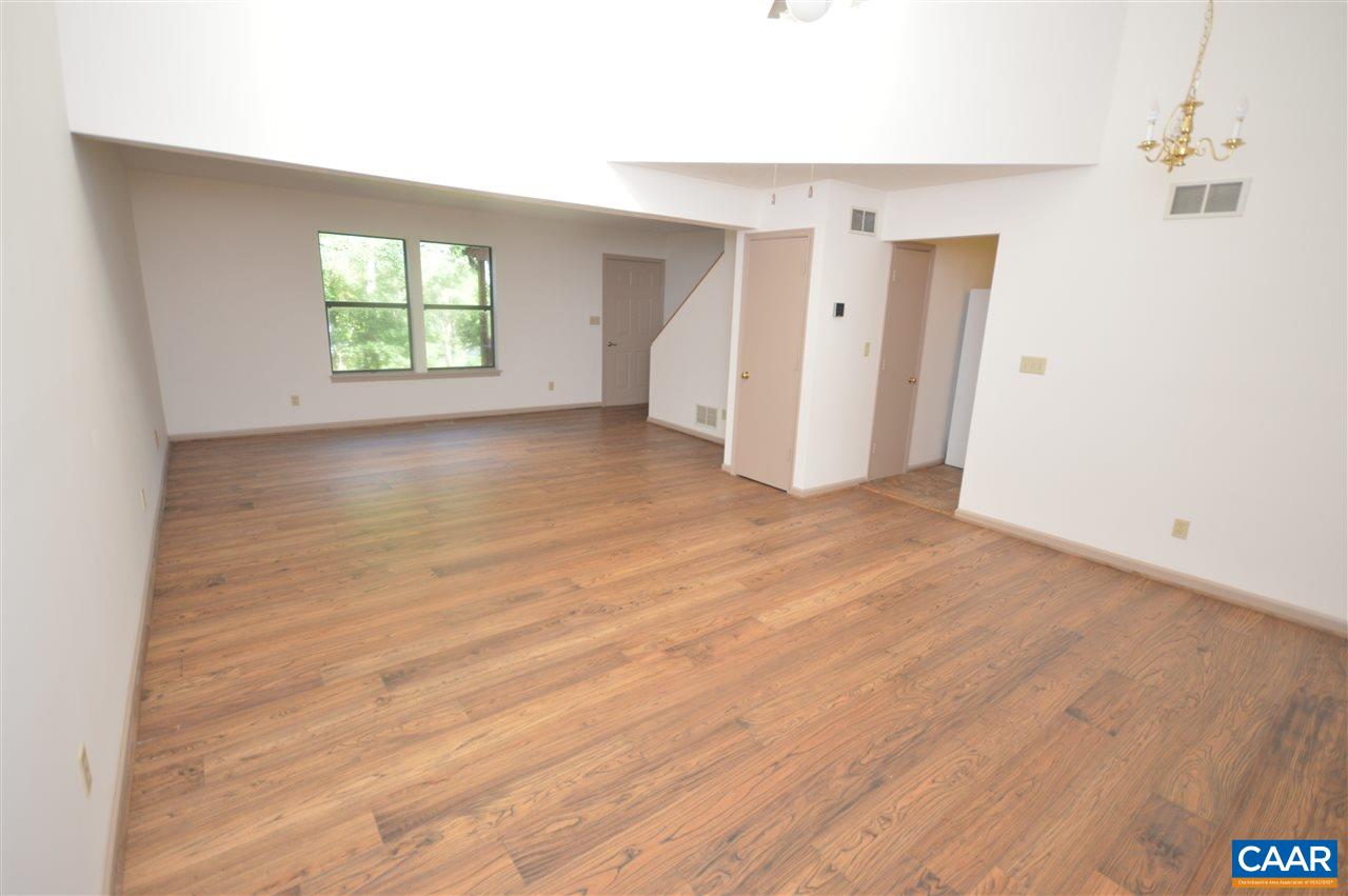 95 Westview Road Ruckersville, VA 22968 - Photo 28 of 42 an empty room with wooden floor and a window
