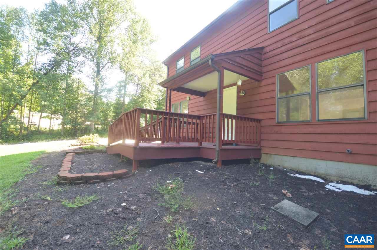 95 Westview Road Ruckersville, VA 22968 - Photo 3 of 42 a view of a backyard with a tub