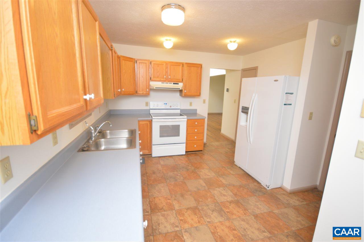 95 Westview Road Ruckersville, VA 22968 - Photo 32 of 42 a view of a kitchen with a stove top oven