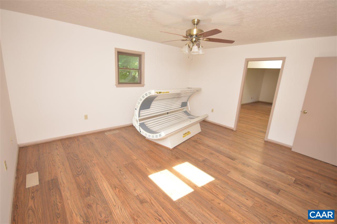 95 Westview Road Ruckersville, VA 22968 - Photo 40 of 42 a view of a room with wooden floor and window