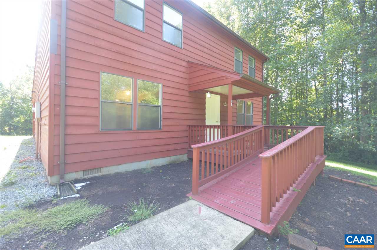 95 Westview Road Ruckersville, VA 22968 - Photo 4 of 42 a view of a house with a yard and wooden fence