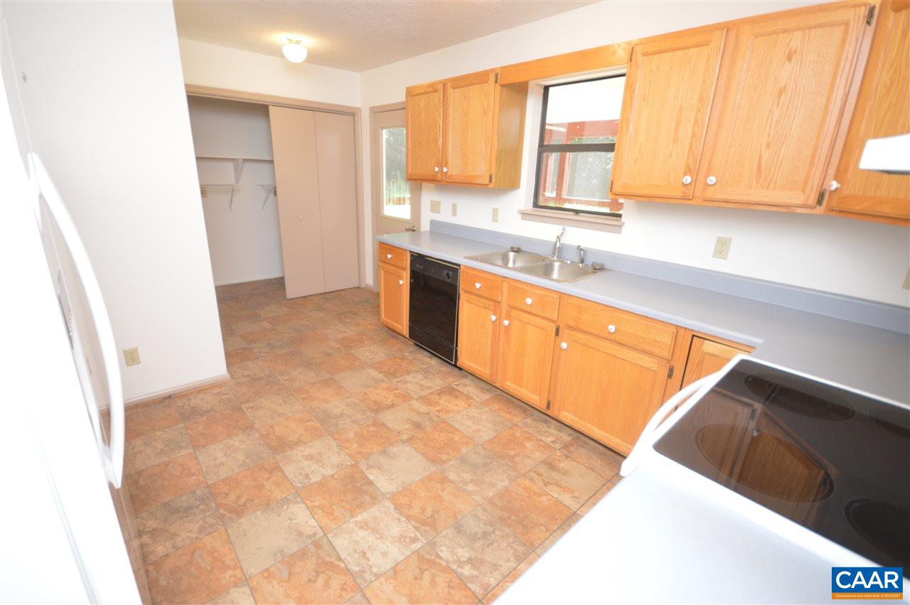 95 Westview Road Ruckersville, VA 22968 - Photo 41 of 42 a view of a kitchen with wooden floor and a sink
