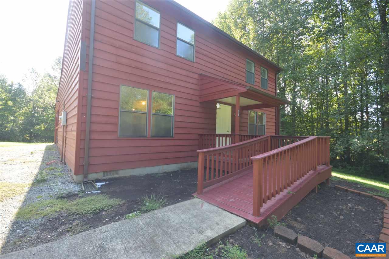 95 Westview Road Ruckersville, VA 22968 - Photo 5 of 42 a view of a house with a yard and wooden fence