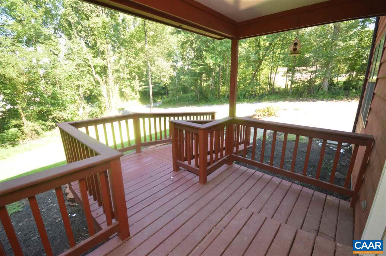 95 Westview Road Ruckersville, VA 22968 - Photo 7 of 42 a view of a wooden deck with a yard