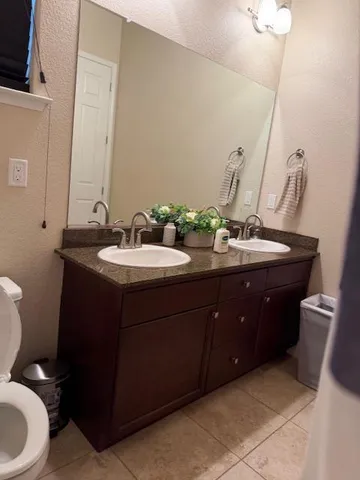 a bathroom with a sink and a toilet