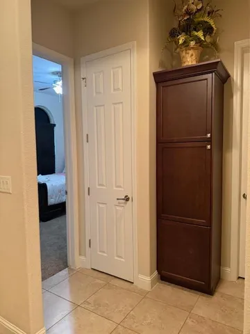 a view of entryway with a mirror and a rug