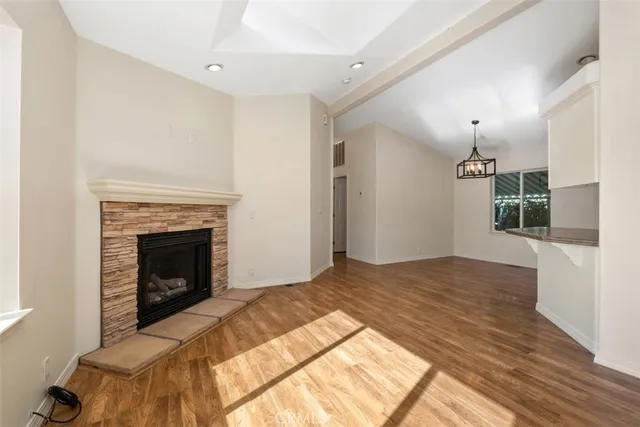 a bedroom with a bed and a fireplace