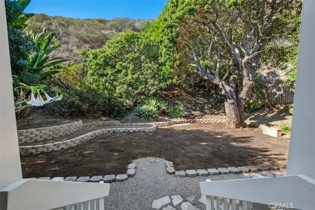 a view of a backyard of a house