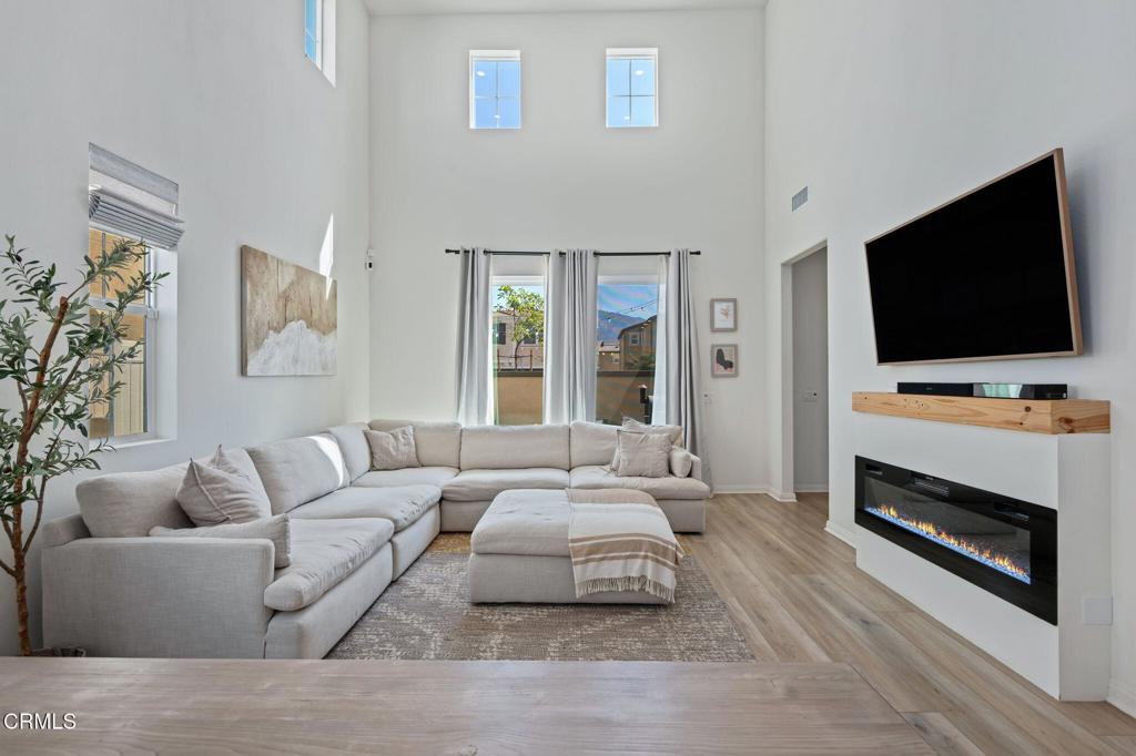 1991 Pomegranate Street Santa Paula, CA 93060 - Photo 20 of 46 a living room with furniture and a flat screen tv