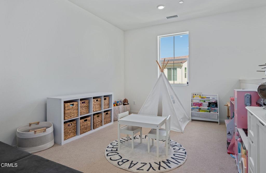 1991 Pomegranate Street Santa Paula, CA 93060 - Photo 26 of 46 a living room with furniture and a wooden floor