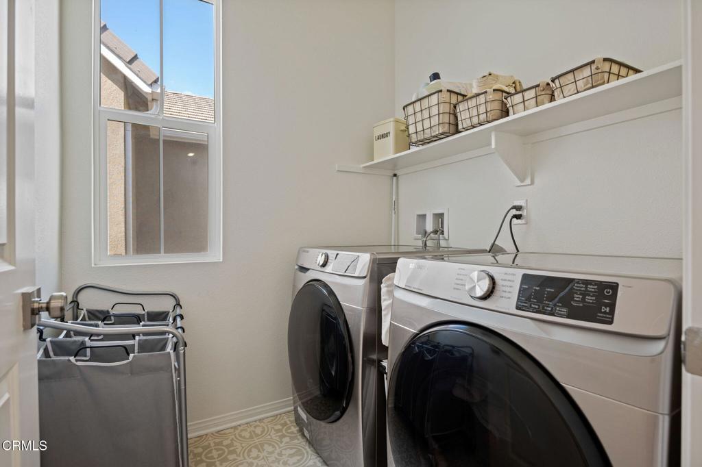 1991 Pomegranate Street Santa Paula, CA 93060 - Photo 34 of 46 a utility room with dryer and washer