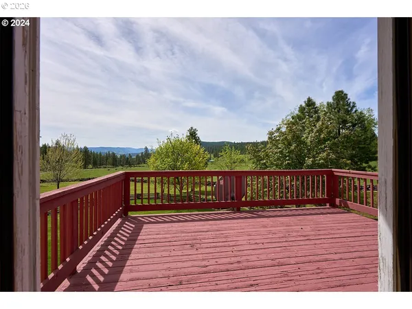 a view of a golf course with a lake