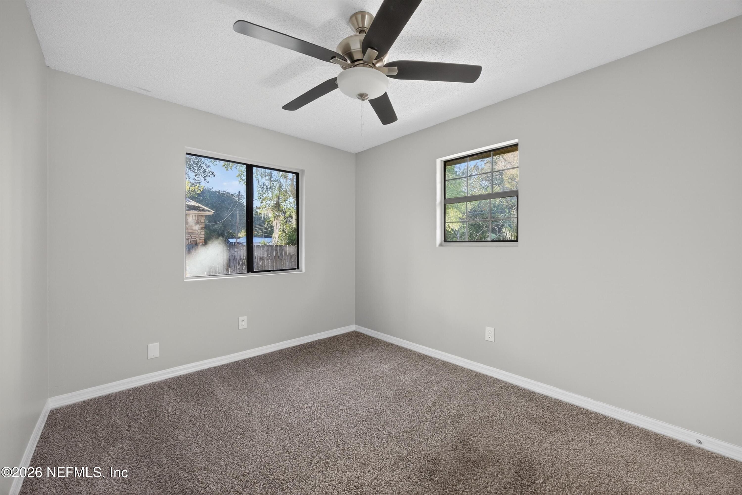 591 Julia Street St. Augustine, FL 32084 - Photo 13 of 25 a view of an empty room with a window