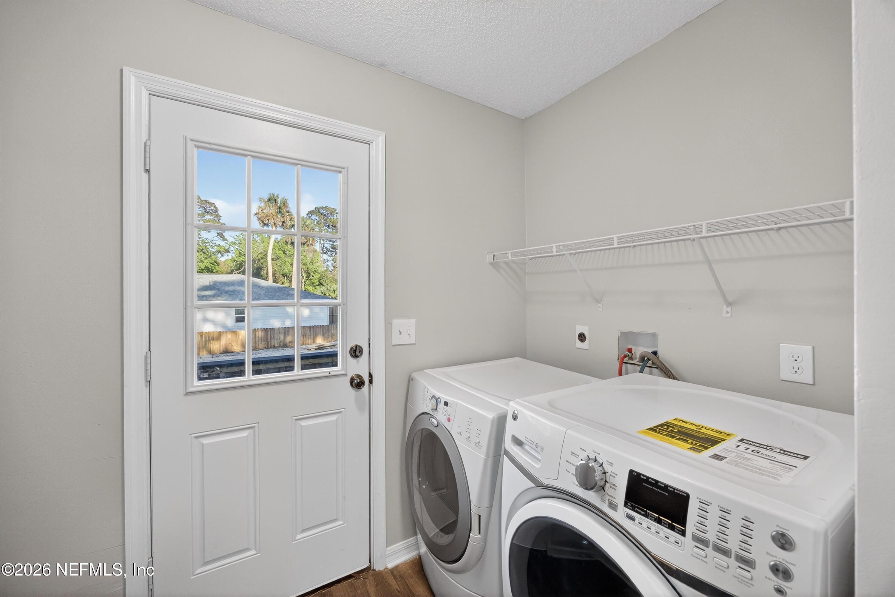 591 Julia Street St. Augustine, FL 32084 - Photo 15 of 25 a utility room with dryer and washer