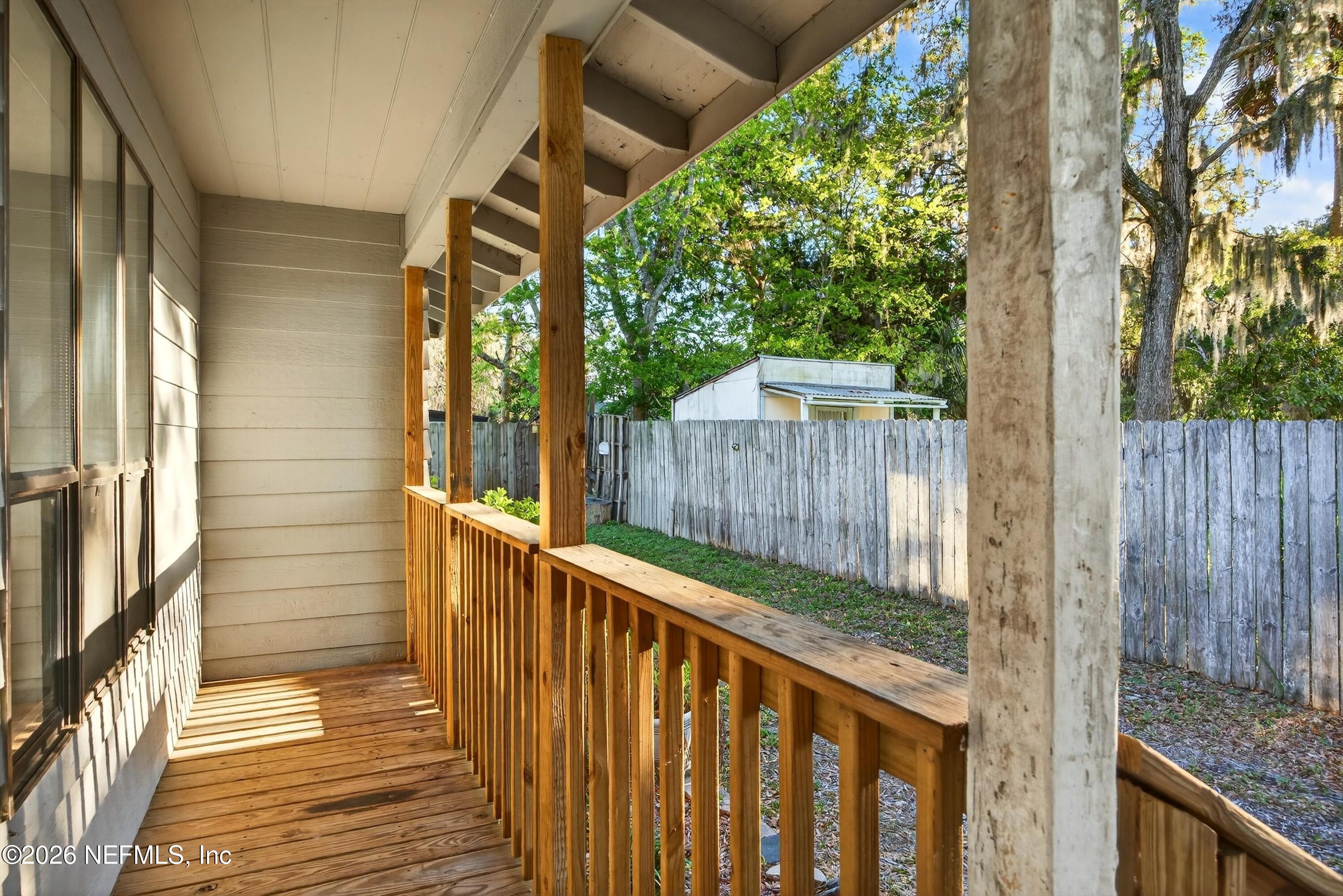 591 Julia Street St. Augustine, FL 32084 - Photo 3 of 25 a view of a pathway of a wooden deck