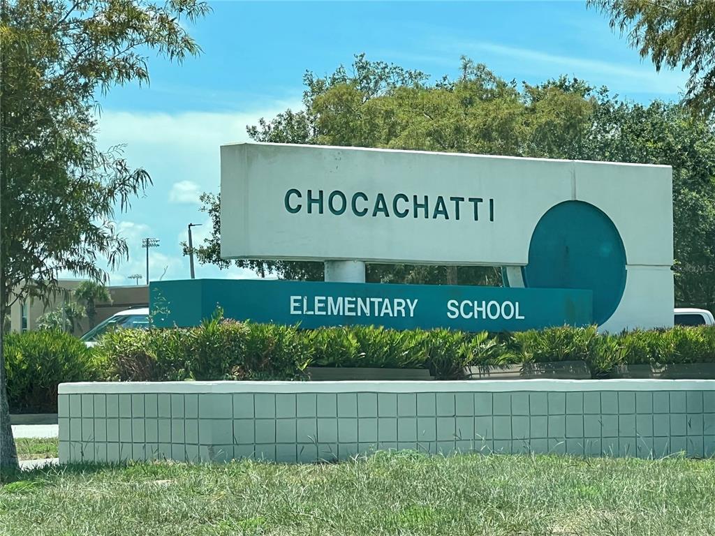 Spring Hill Dr Spring Hill Spring Hill, FL 34604 - Photo 3 of 5 a view of outdoor space with sign board