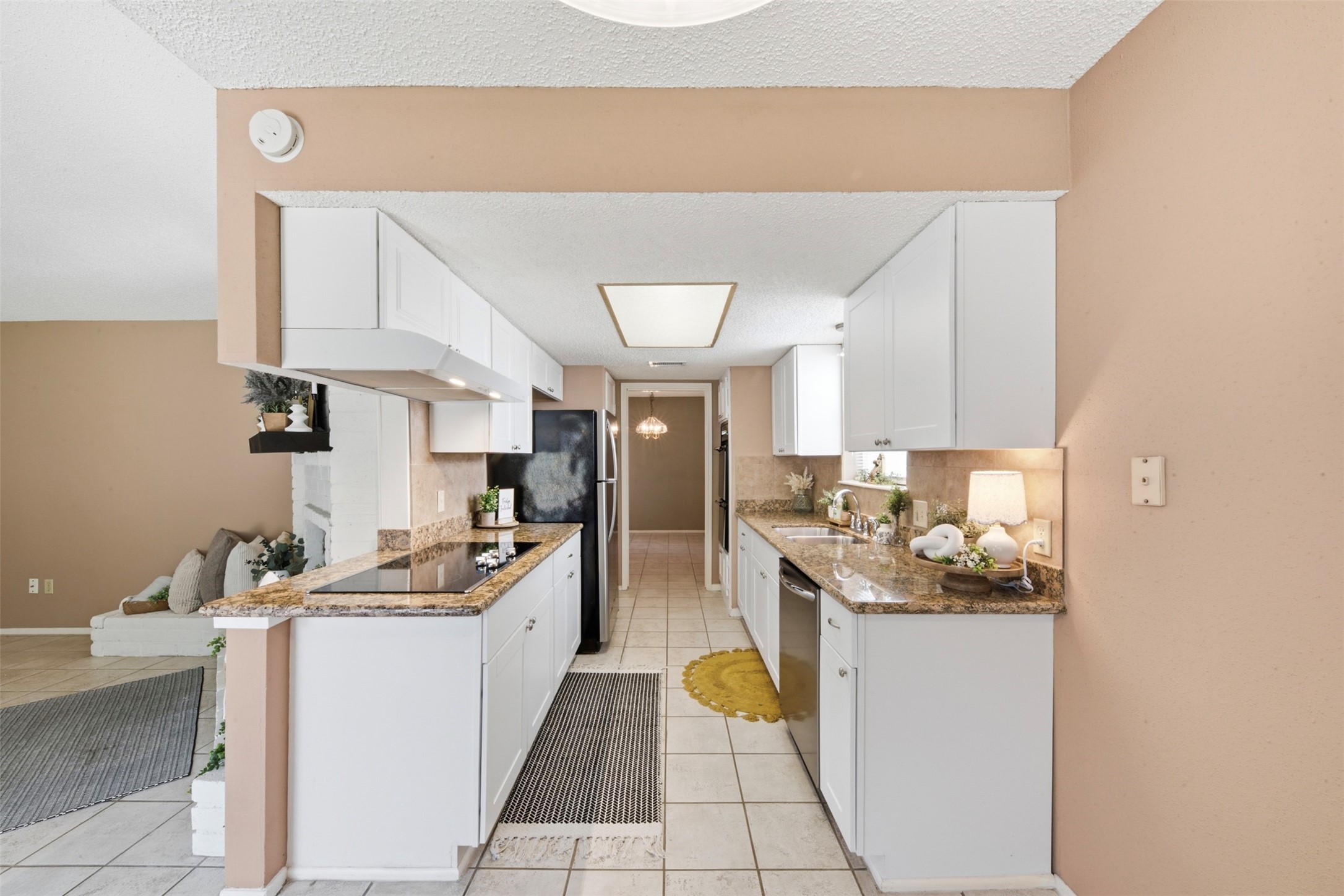 4019 Postwood Drive Spring, TX 77388 - Photo 14 of 50 a kitchen with a sink appliances and cabinets