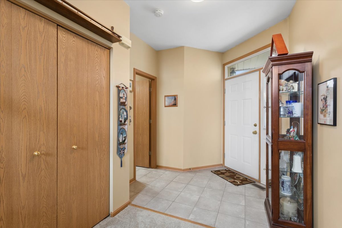 14902 West Victoria Crossing Lockport, IL 60441 - Photo 9 of 23 a view of a hallway with closet area