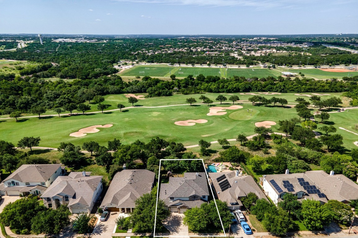 15001 Banbridge Trail Austin, TX 78717 - Photo 1 of 1 an aerial view of residential houses with outdoor space and street view