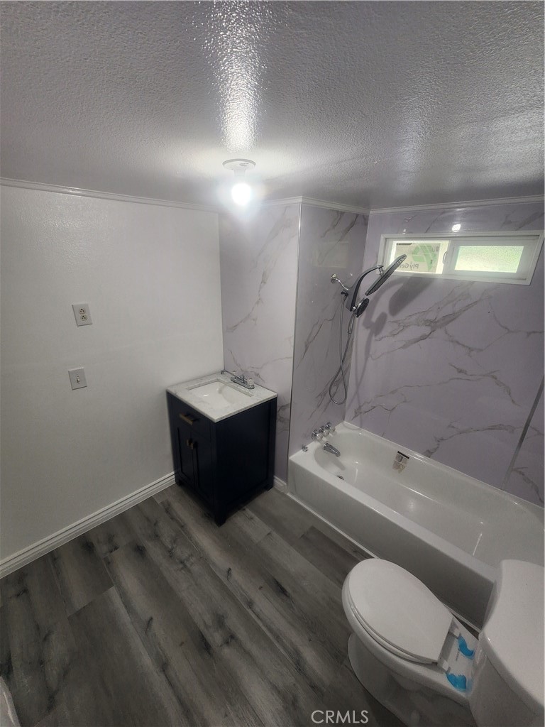 3319 Avalon Street, Unit 78 Riverside, CA 92509 - Photo 30 of 37 a bathroom with a sink toilet and shower