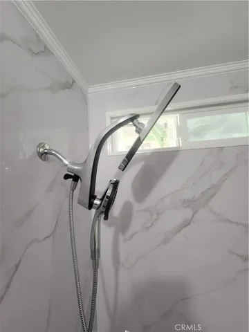 a close up of a white marble wall