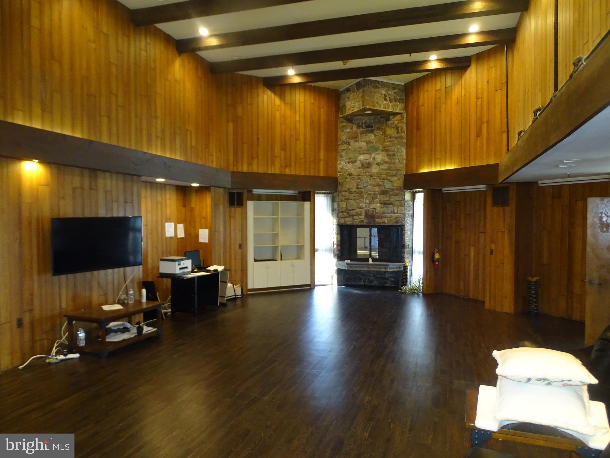 2754 Willits Road Philadelphia, PA 19136 - Photo 8 of 36 Stone floor to ceiling fireplace