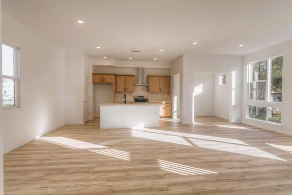 a view of a kitchen and a window
