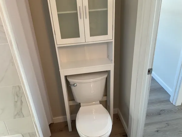 a close view of a toilet in bathroom