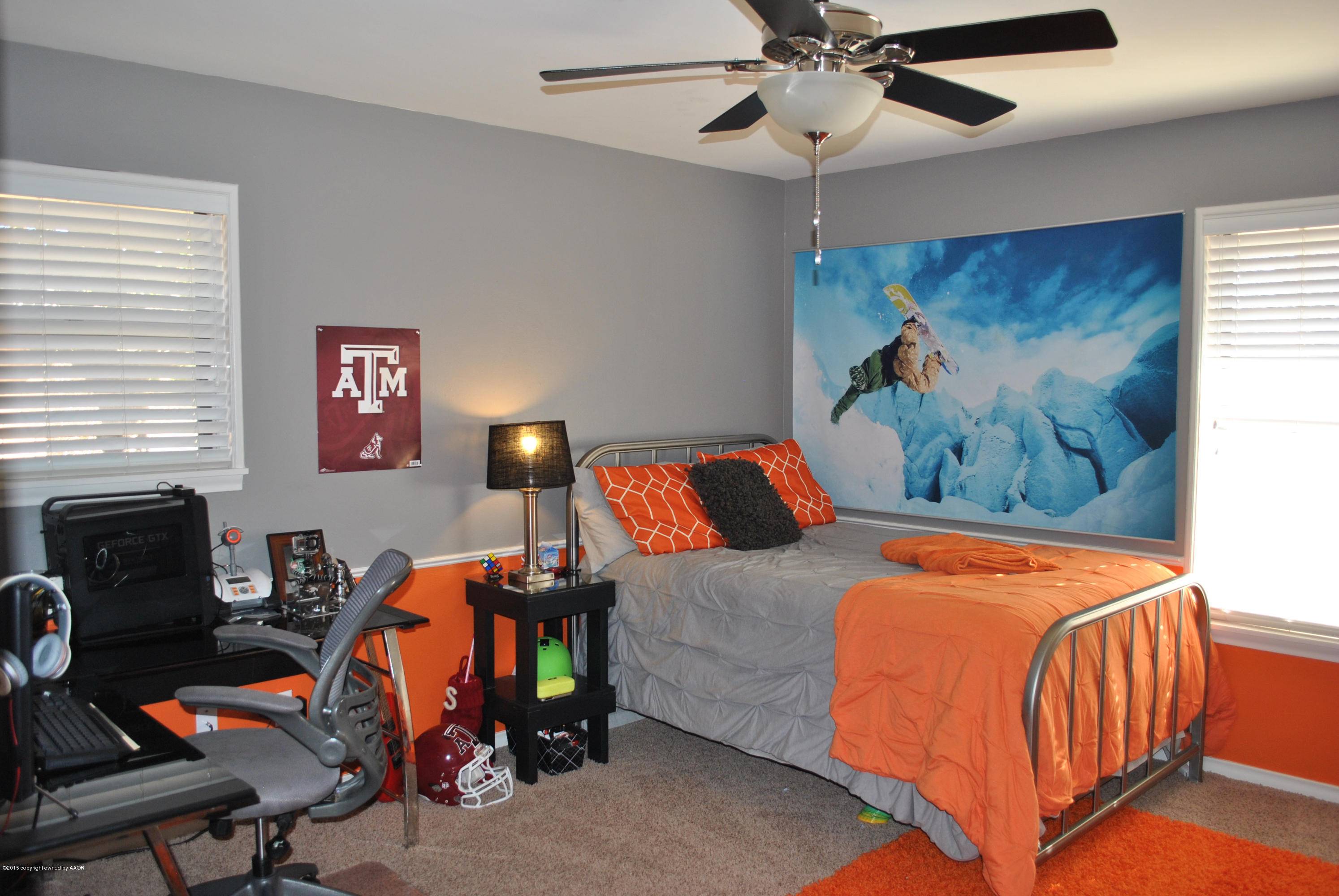 6604 Dreyfuss Road Amarillo, TX 79106 - Photo 17 of 31 a bedroom with a bed and a window