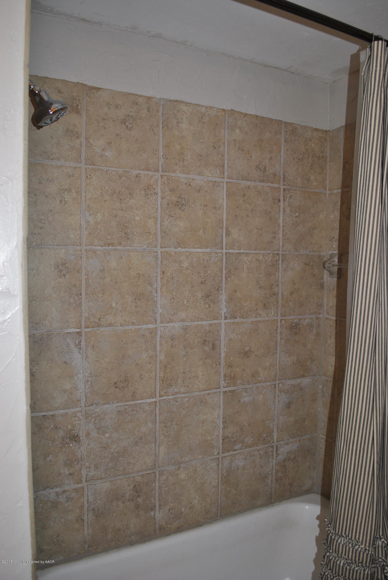 6604 Dreyfuss Road Amarillo, TX 79106 - Photo 20 of 31 a bathroom with a shower