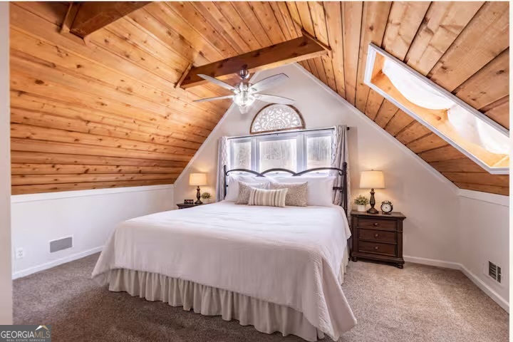 68 Franklin Road Eatonton, GA 31024 - Photo 25 of 28 a bedroom with a bed and a window