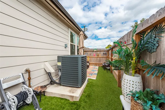 a view of balcony with furniture