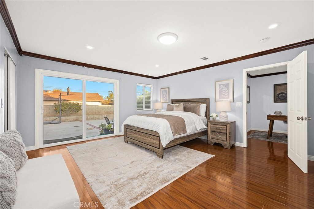 5620 Halifax Road Arcadia, CA 91007 - Photo 11 of 21 a bedroom with a large bed and a large window