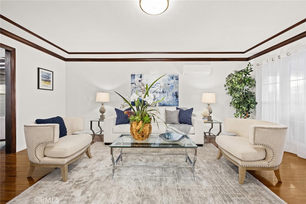 5620 Halifax Road Arcadia, CA 91007 - Photo 5 of 21 a living room with a couch and a potted plant