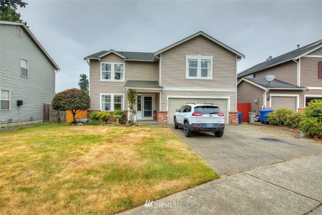 24425 101st Place Southeast Kent, WA 98030 - Photo 1 of 28 a car parked in front of a house