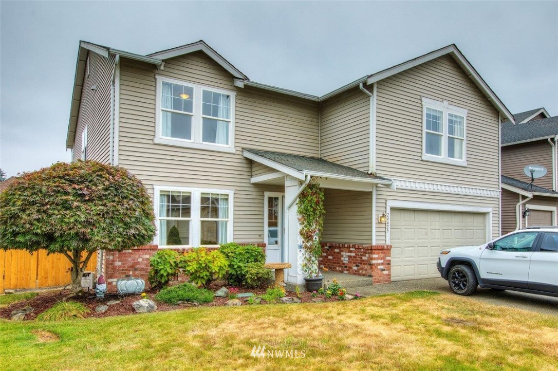 24425 101st Place Southeast Kent, WA 98030 - Photo 2 of 28 a view of a house with a patio