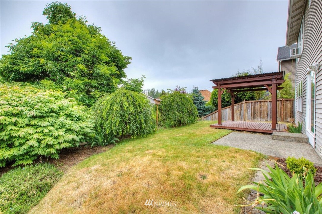 24425 101st Place Southeast Kent, WA 98030 - Photo 25 of 28 a view of backyard with green space