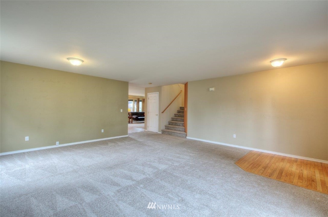 24425 101st Place Southeast Kent, WA 98030 - Photo 6 of 28 a view of an empty room with a window