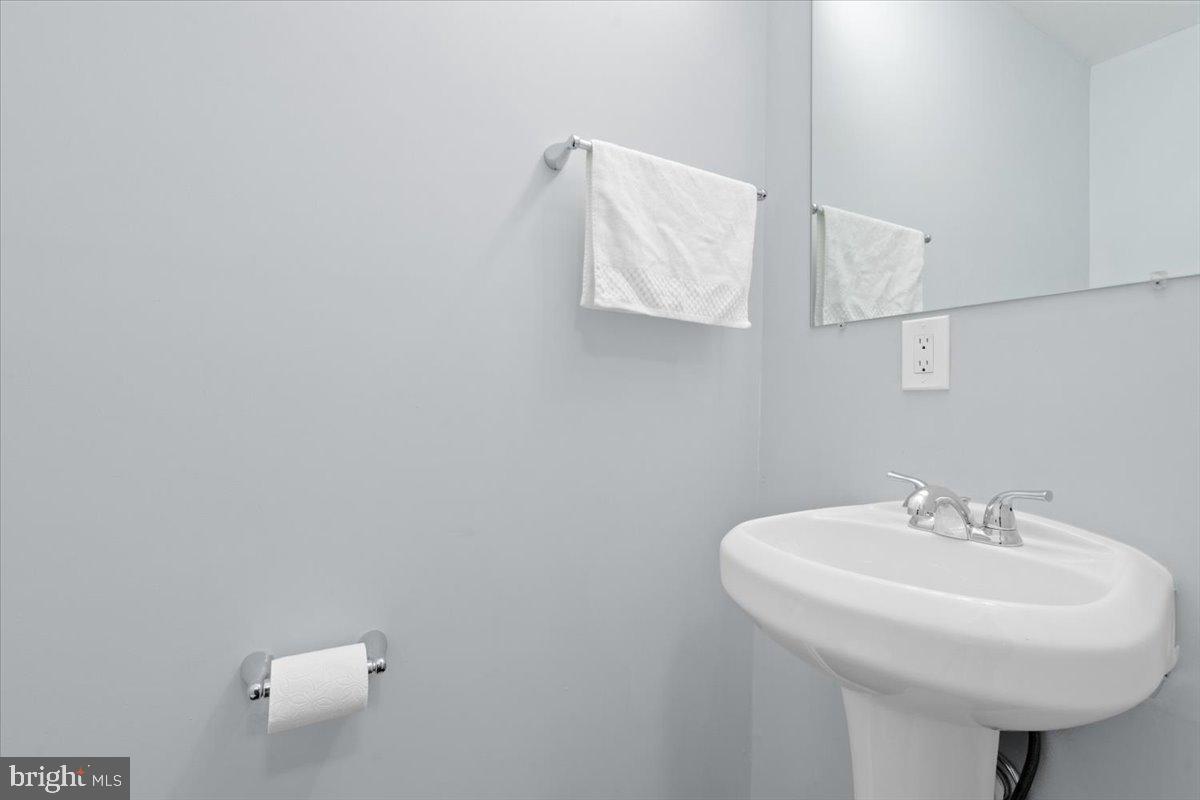 9671 Horsham Drive Laurel, MD 20723 - Photo 11 of 48 Half bathroom on the main level.
