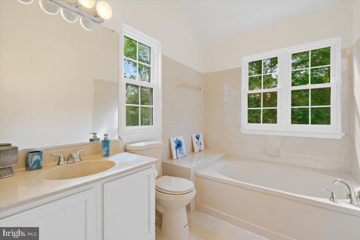 9671 Horsham Drive Laurel, MD 20723 - Photo 23 of 48 Bathroom with bathtub and shower