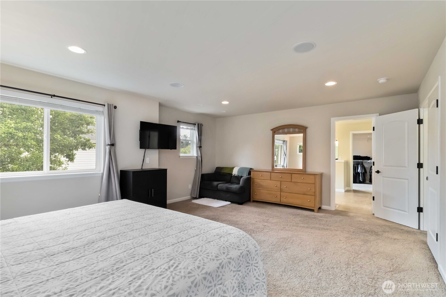 6721 Southeast 2nd Street Renton, WA 98059 - Photo 16 of 32 a bedroom with a bed and a large window