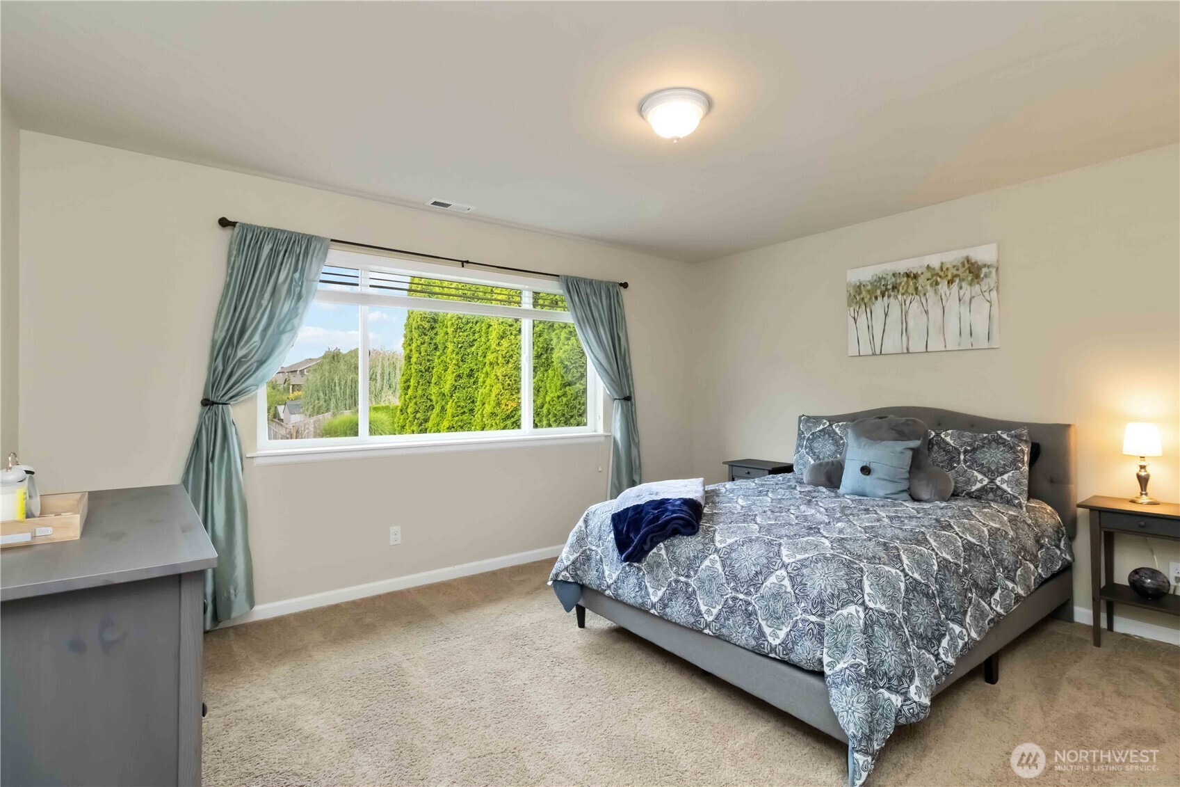 6721 Southeast 2nd Street Renton, WA 98059 - Photo 21 of 32 a bedroom with a bed and a window