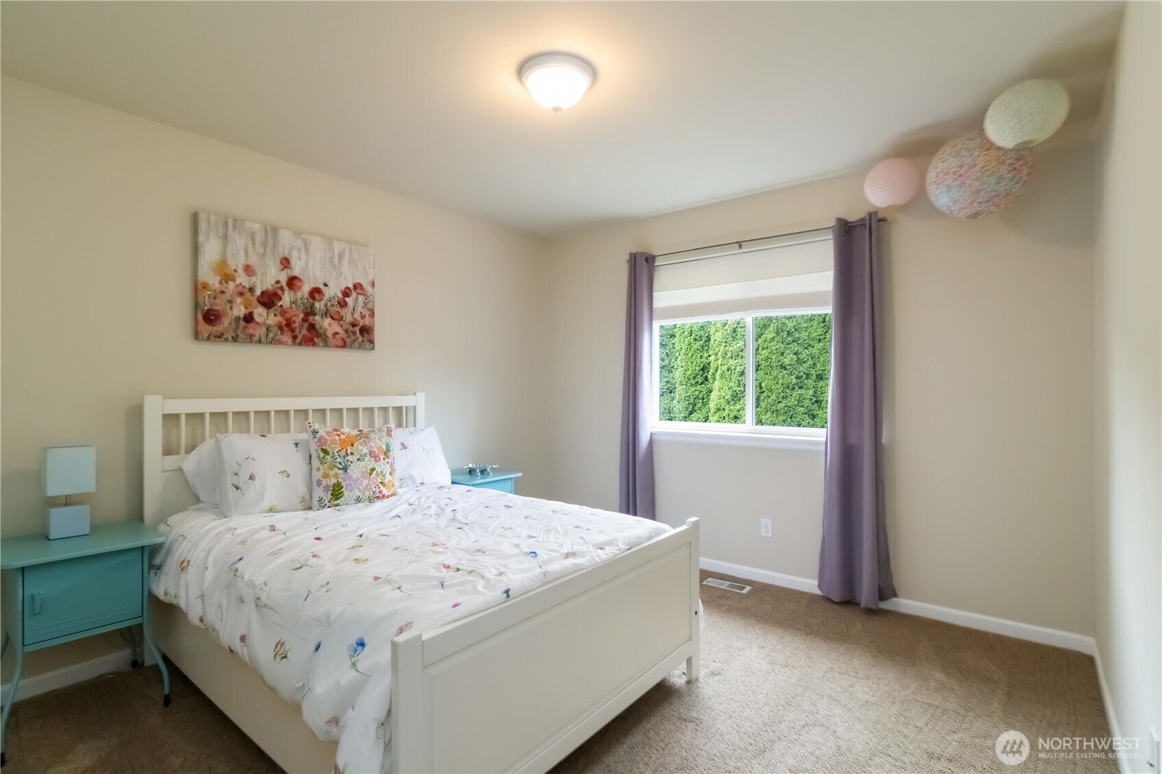 6721 Southeast 2nd Street Renton, WA 98059 - Photo 25 of 32 a bedroom with a large bed and a window